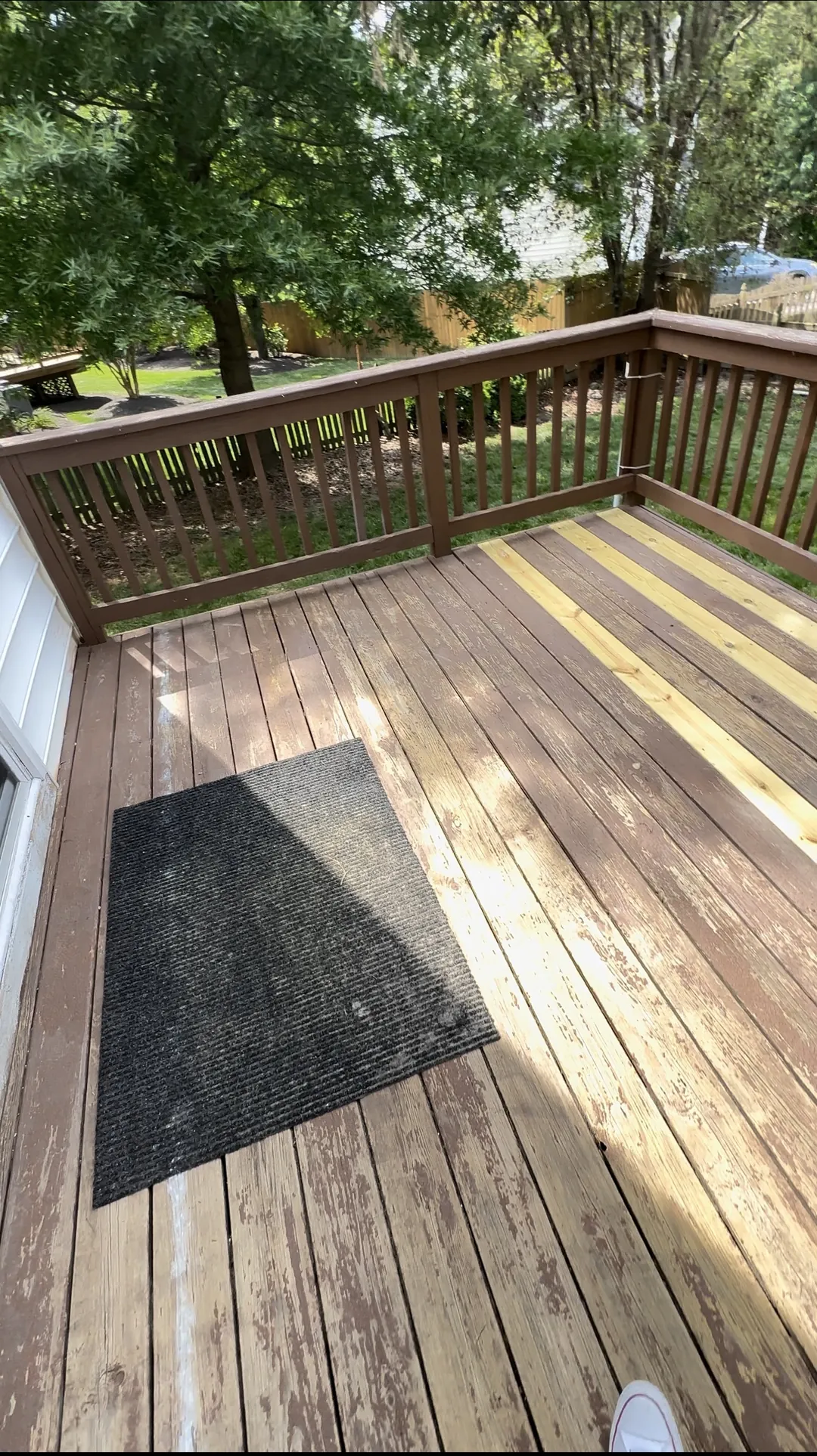 Weathered deck boards before refinishing